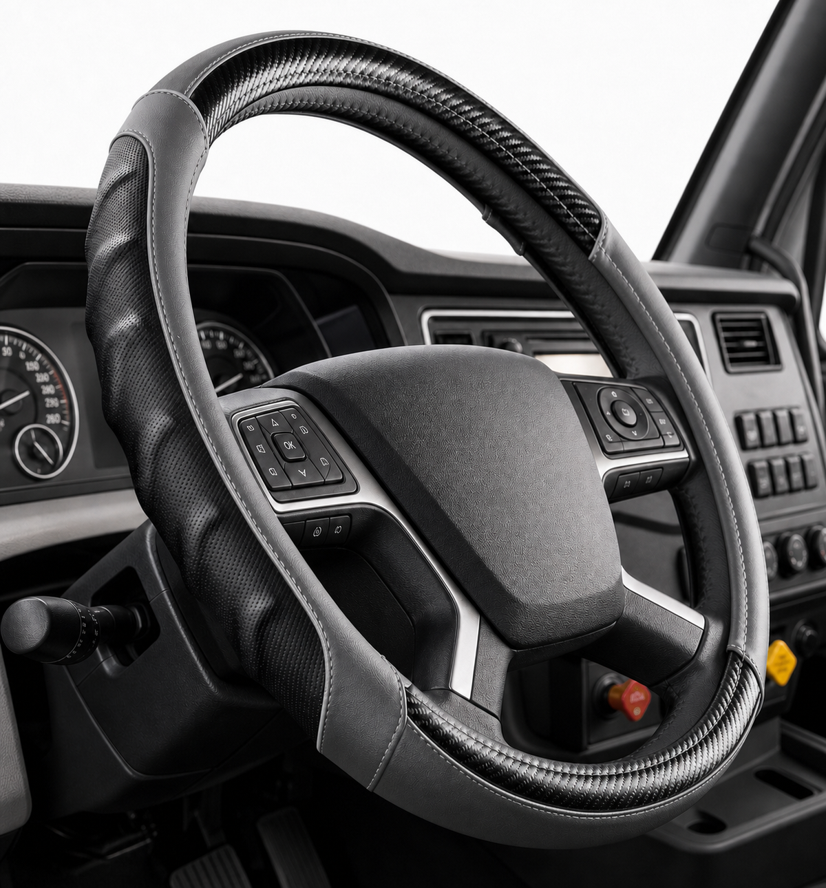 Grey | Vyonix 18 inch semi truck steering wheel cover in Grey with black carbon fibre accents, fitted in a truck cab