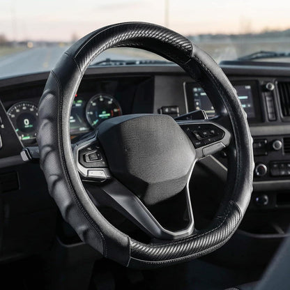 Vyonix 15 inch carbon fiber D-shape steering wheel cover installed on a car dashboard